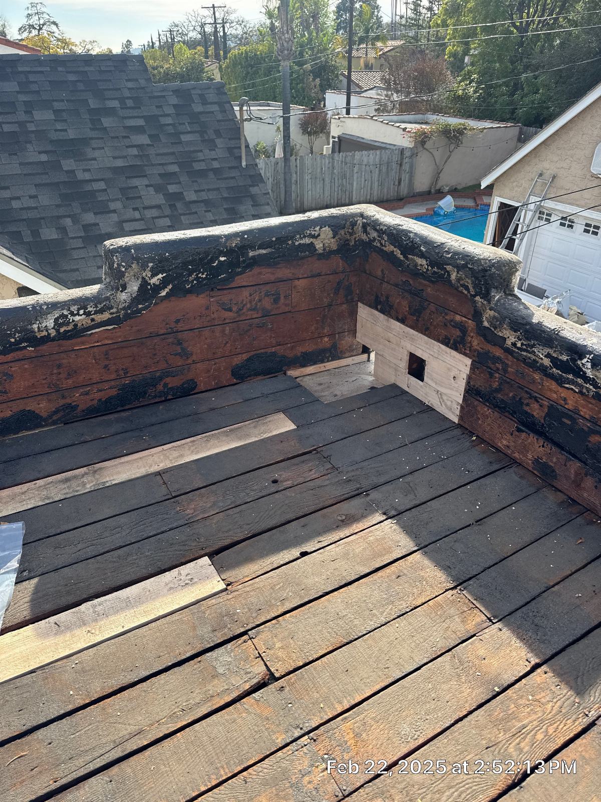 Flat roof wood deck stripped of old built-up roofing membrane in Glendale | Roof Replacement Inc Flat roof wood deck stripped of old built-up roofing membrane — Glendale — Roof Replacement Inc