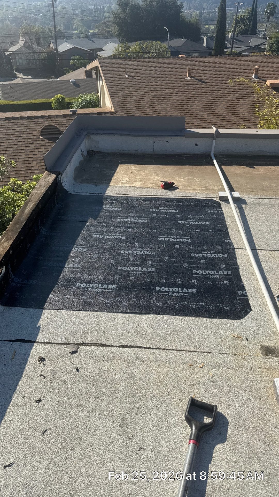 Flat roof leak repair patch with a new base sheet over the damaged area — Roof Replacement Inc