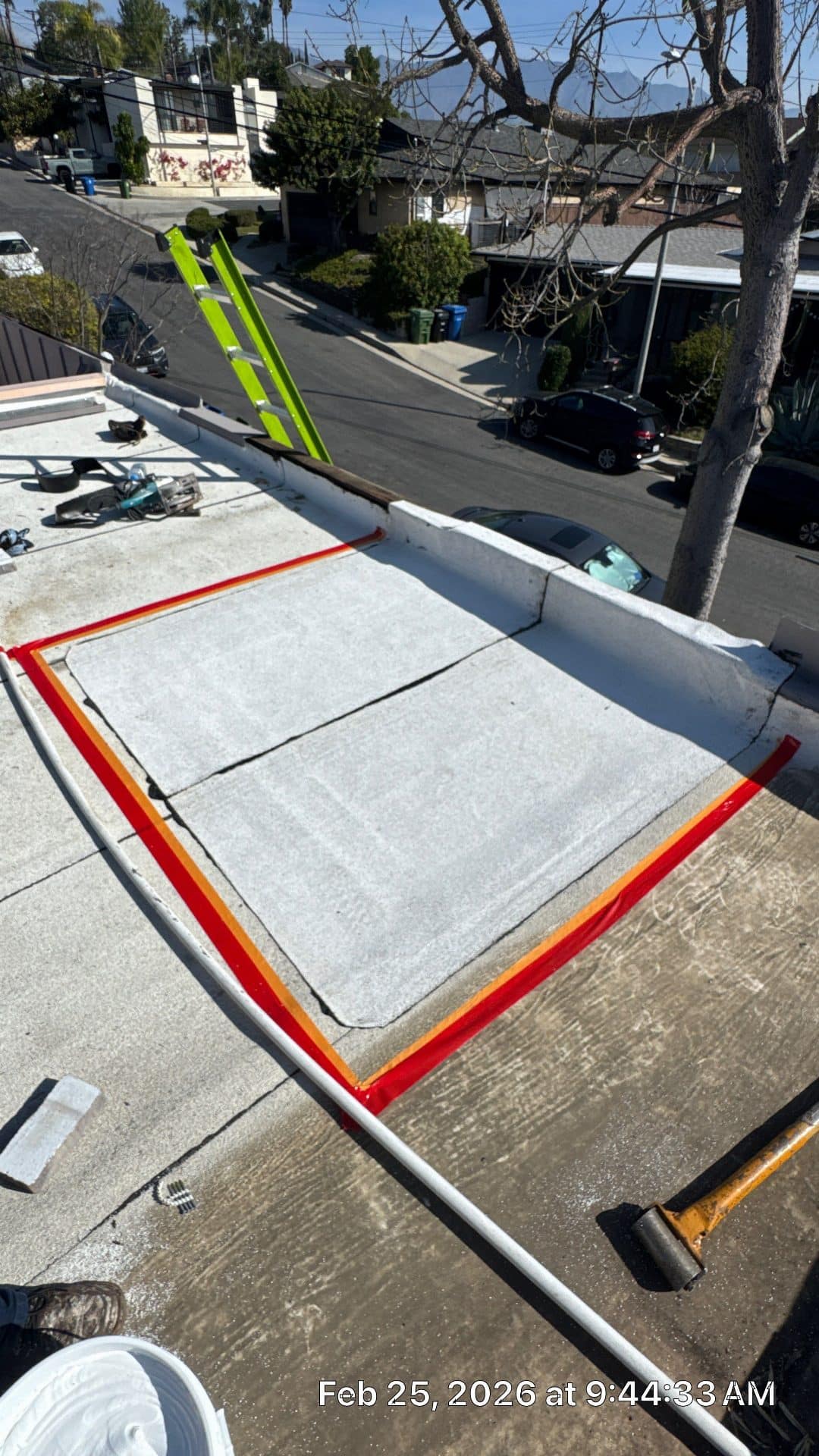 Flat roof patch with fiberglass mat, red flashing tape, roller tool — Highland Park — Roof Replacement Inc