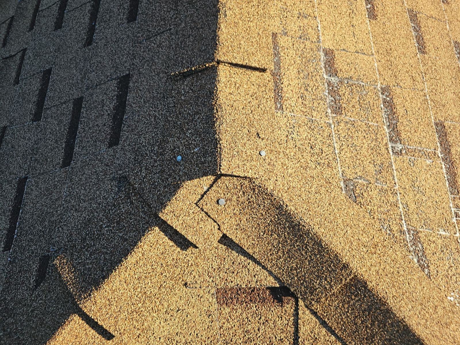 New tan shingles installed beside existing dark asphalt shingles, roofing nails visible — Santa Clarita