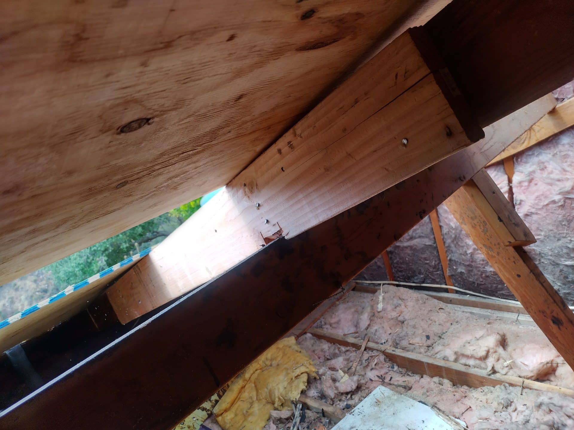 Underside of roof rafters, sheathing, ridge beam, and insulation — Altadena — Roof Replacement Inc