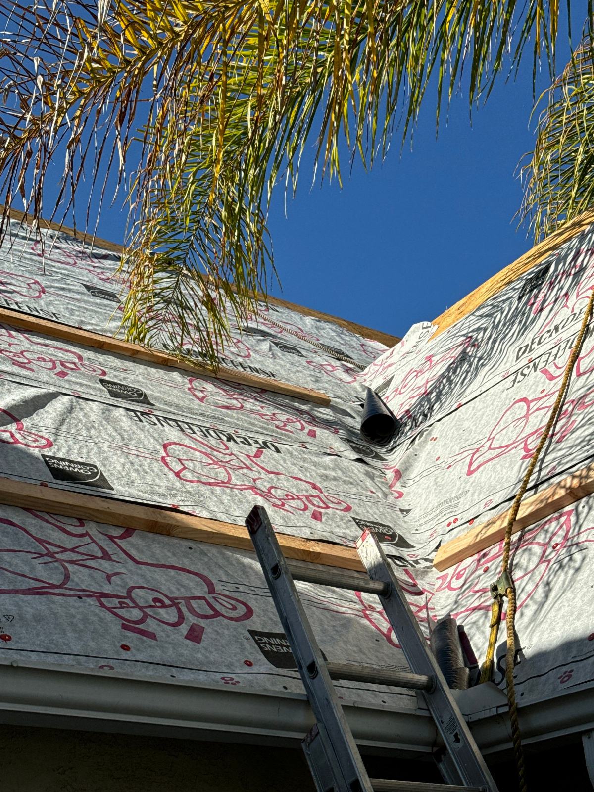 Roof deck covered with Owens Corning underlayment, valley junction, ladder, pipe boot in Glendale | Roof Replacement Inc Roof deck covered with Owens Corning underlayment, valley junction, ladder, pipe boot — Glendale — Roof Replacement Inc