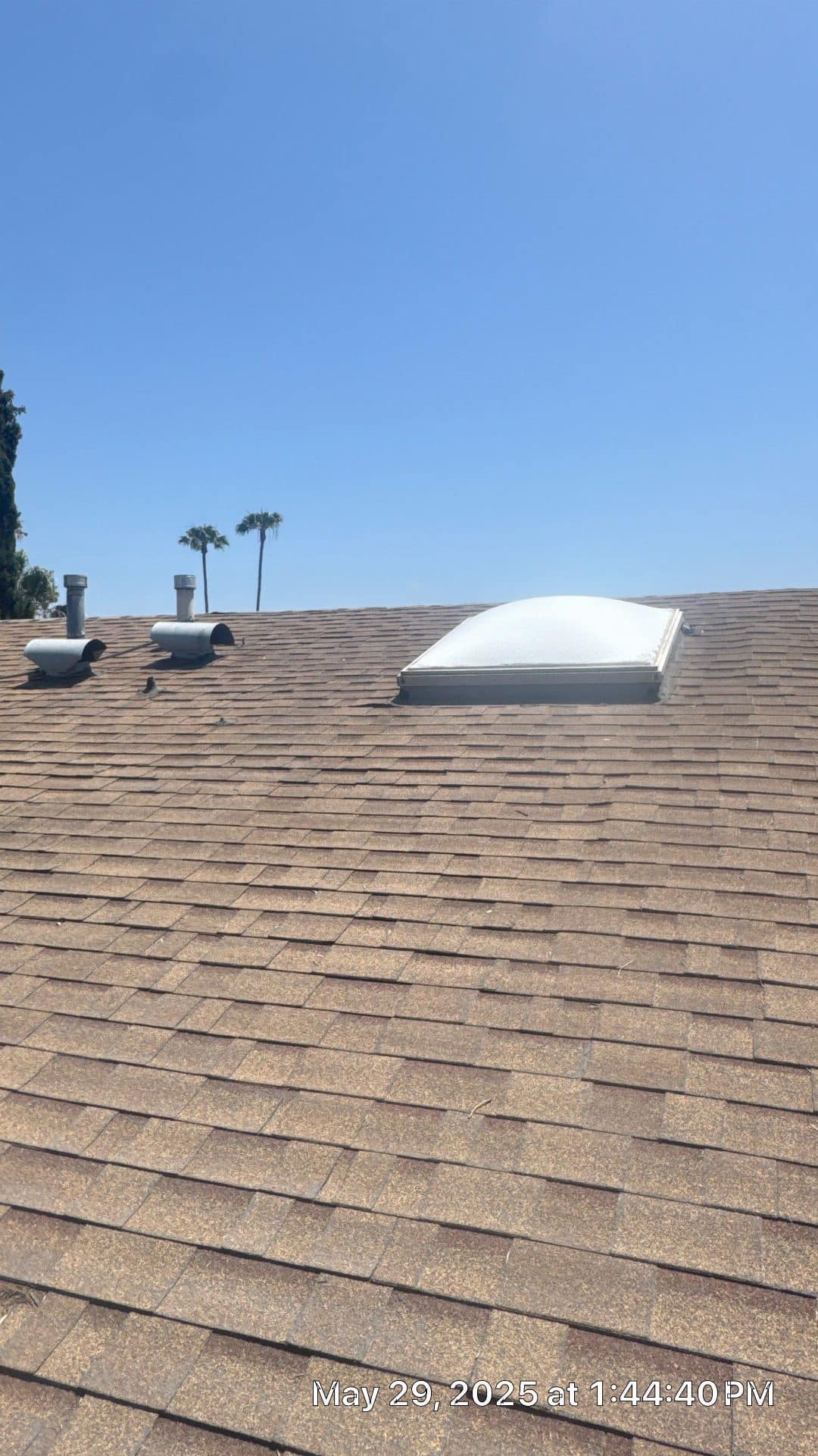 Asphalt shingle roof with dome skylight and metal vents — Sherman Oaks — Roof Replacement Inc