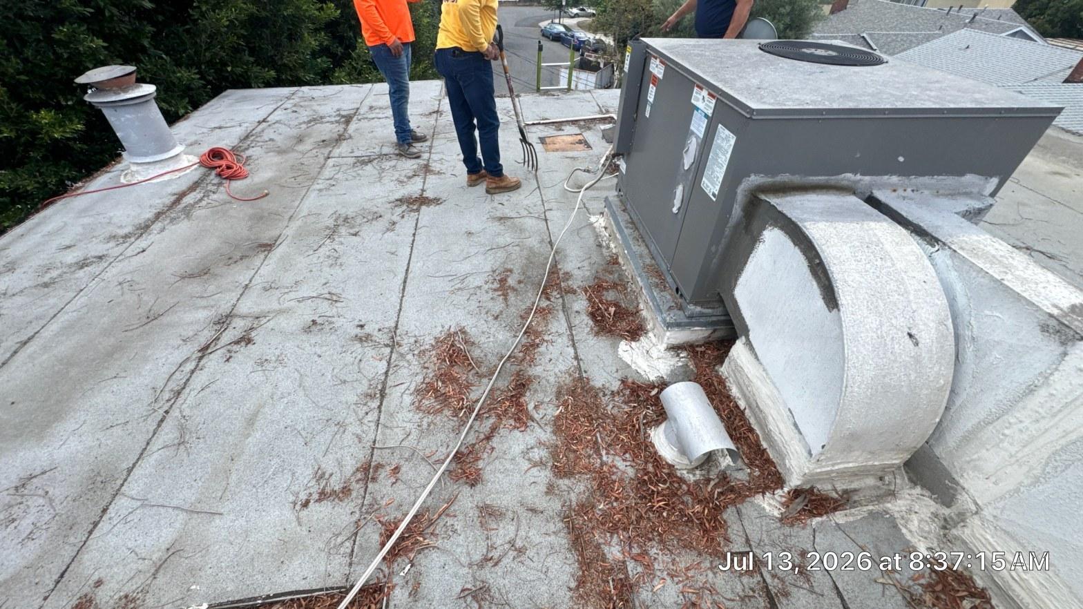 Completed torch down flat roof installation work at Roof Replacement Inc