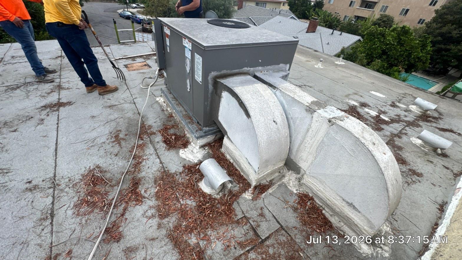 Completed torch down flat roof installation work at Roof Replacement Inc