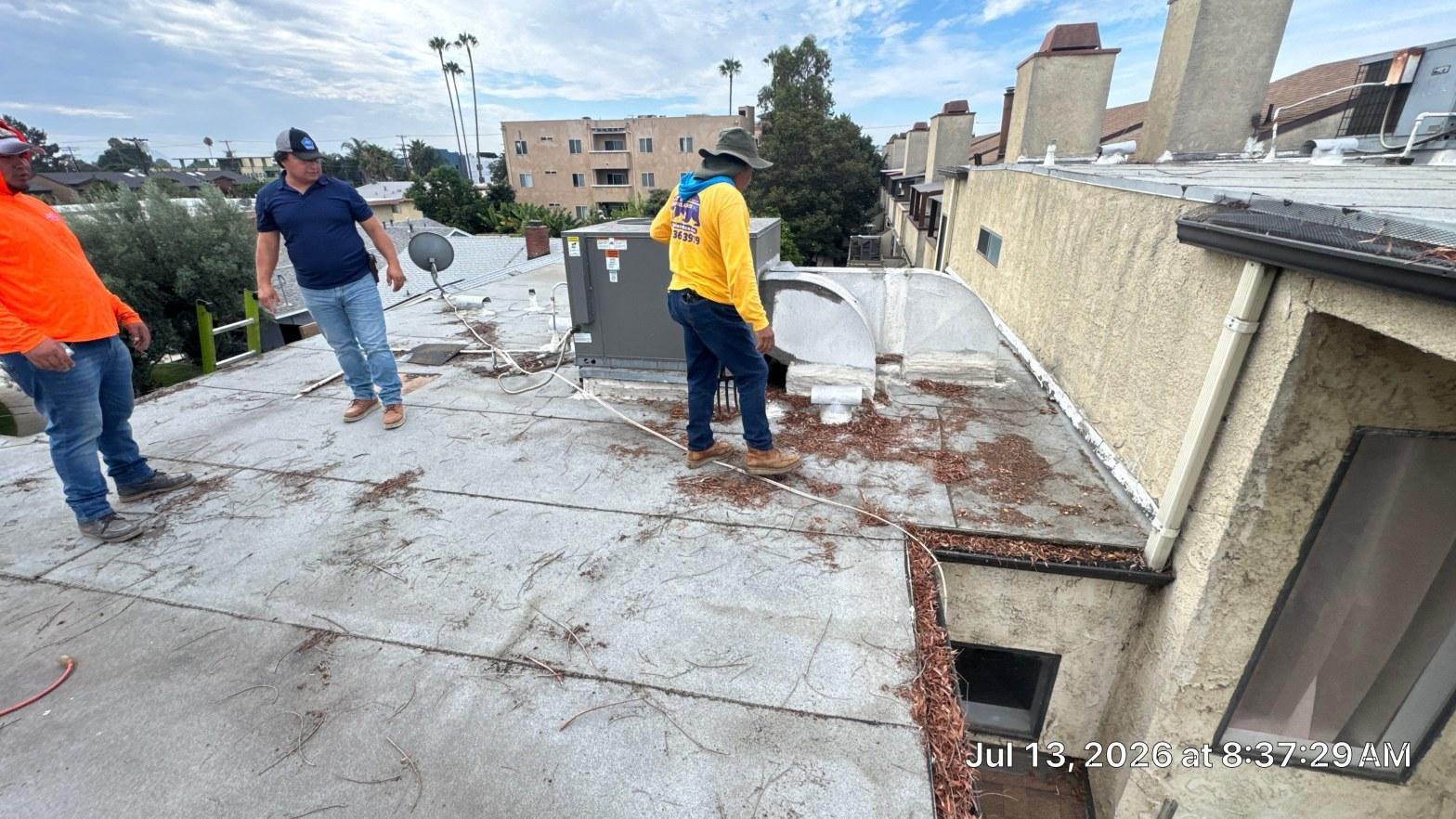 Completed torch down flat roof installation work at Roof Replacement Inc