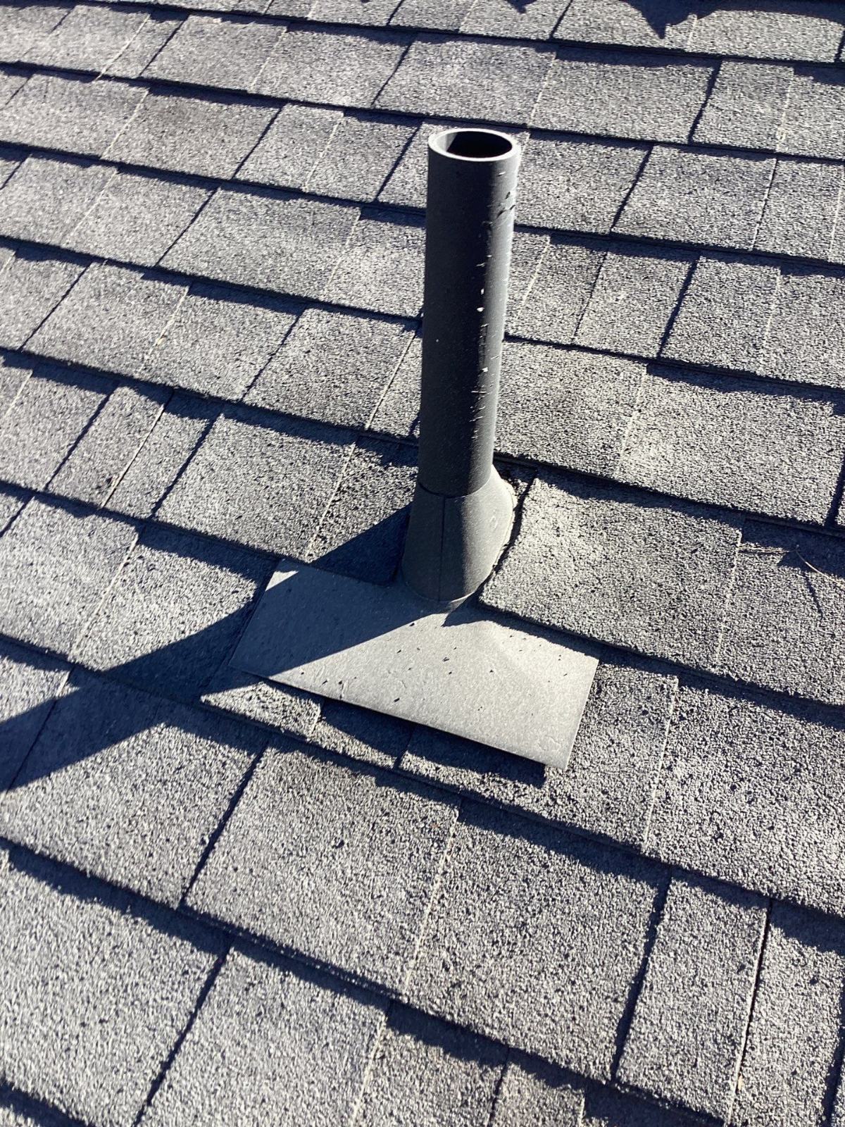 Plumbing vent pipe with rubber boot flashing on asphalt shingle roof — Encino — Roof Replacement Inc
