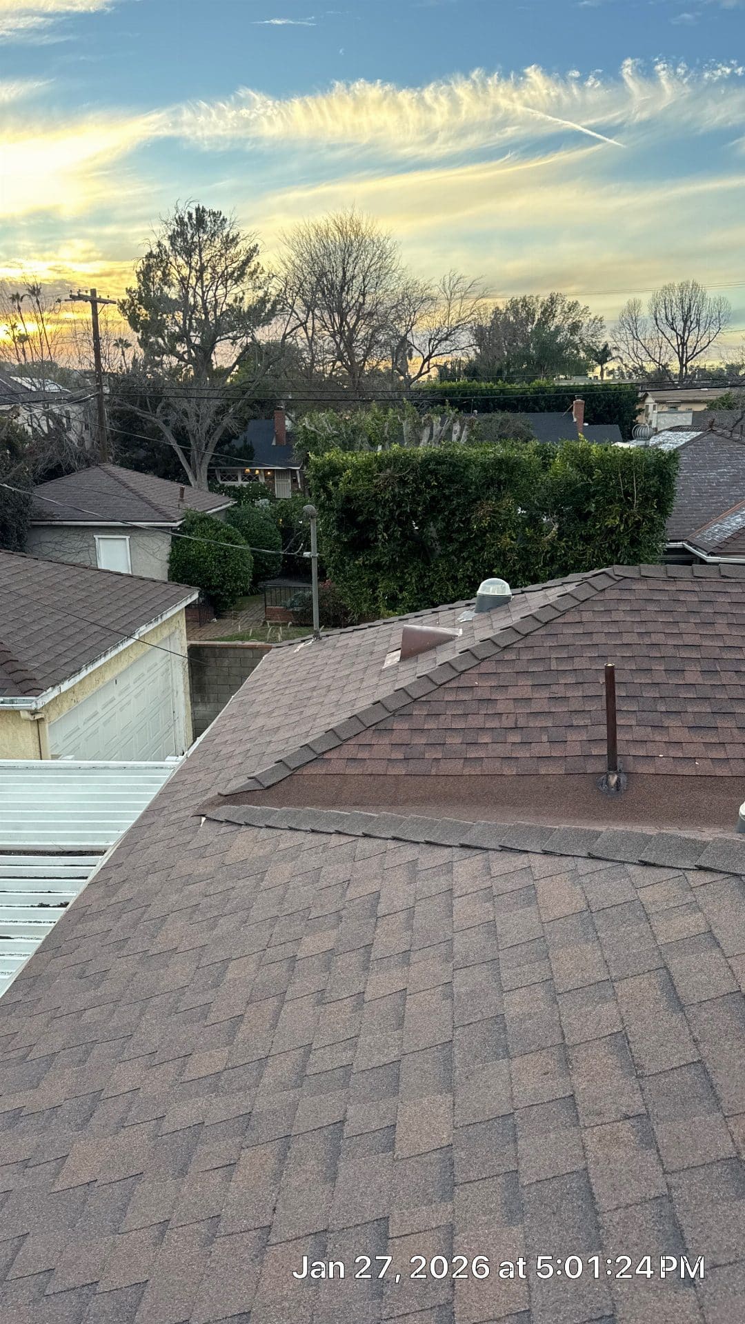 Asphalt shingle hip roof with pipe boot and dome vent in Sherman Oaks | Roof Replacement Inc Asphalt shingle hip roof with pipe boot and dome vent — Sherman Oaks — Roof Replacement Inc