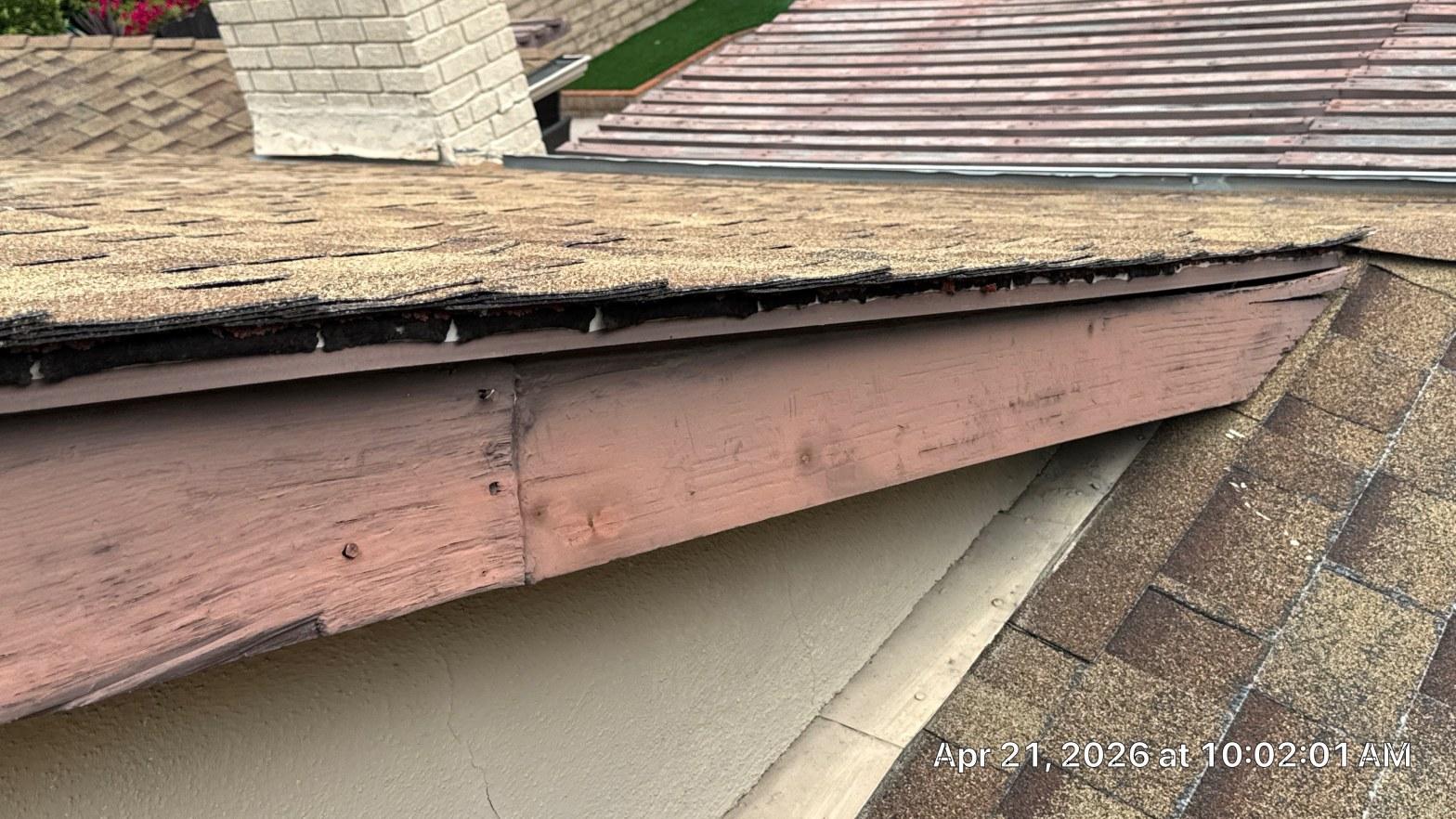 Rotted fascia and curling shingle eave edge on San Fernando Valley home before reroof rebuild