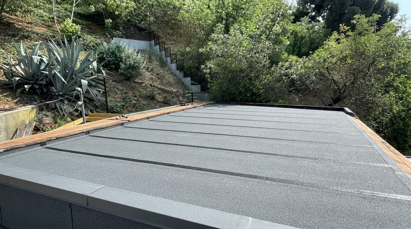 Completed torch down flat roof installation work at Roof Replacement Inc