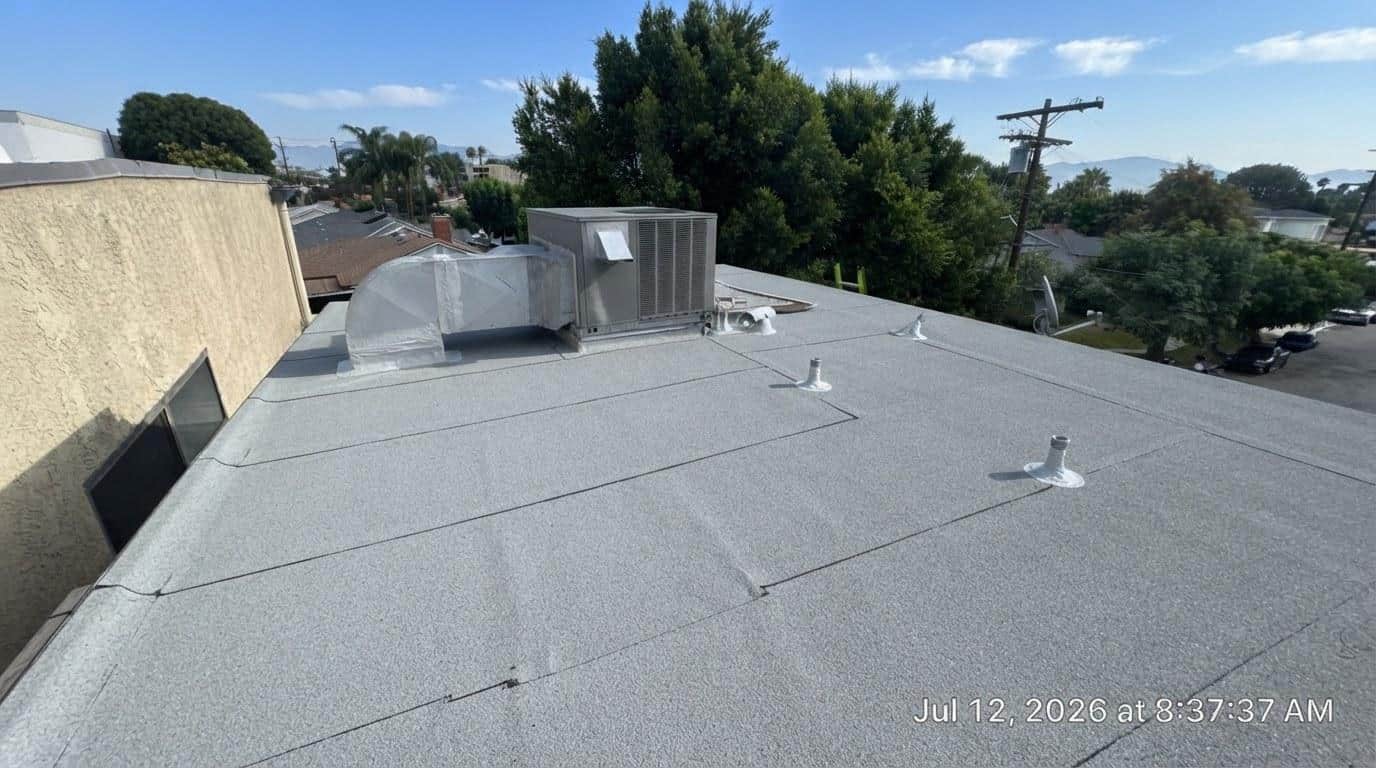 Completed torch down flat roof installation work at Roof Replacement Inc